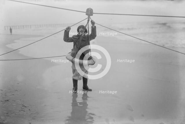 Man demonstrating ship rescue apparatus, 1919. Creator: Bain News Service.