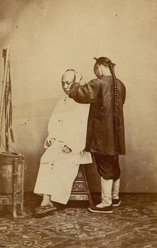 Man Examining Other Man, 1870s. Creator: Unknown