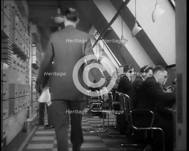 Man Entering Office at BBC Broadcasting House, 1936. Creator: British Pathe Ltd.
