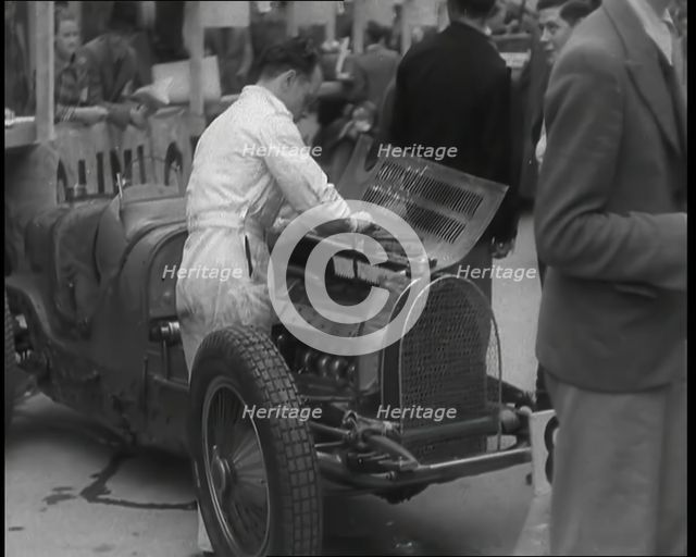 Man Fixing a Racing Car, 1936. Creator: British Pathe Ltd.