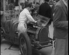 Man Fixing a Racing Car, 1936. Creator: British Pathe Ltd