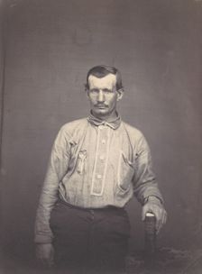 Man Holding Patent Office Book, ca. 1857. Creator: Attributed to Oliver H. Willard