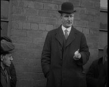 Man in a Bowler Hat Speaking to Crowds, 1920. Creator: British Pathe Ltd