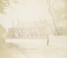 Man in Courtyard Before House, 1850s. Creator: Unknown