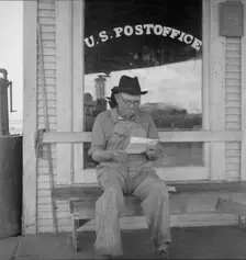 Man in front of post office, Carey, Texas, 1937. Creator: Dorothea Lange
