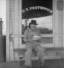 Man in front of post office, Carey, Texas, 1937. Creator: Dorothea Lange
