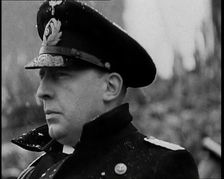 Man in Uniform Listening to a Speech, 1930s. Creator: British Pathe Ltd