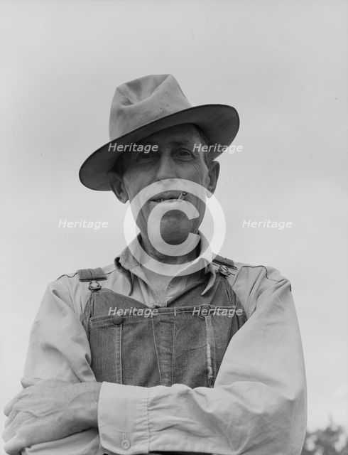 Man living on "Scratch Hill" outside Atoka, Atoka County, Oklahoma, 1938. Creator: Dorothea Lange.