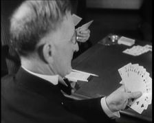 Man Playing Contract Bridge, 1930s. Creator: British Pathe Ltd