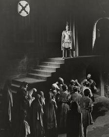 Man standing above crowd, 1938. Creator: Unknown