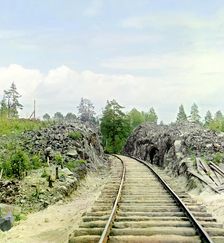 Man standing beside railroad tracks, between 1905 and 1915. Creator: Sergey Mikhaylovich Prokudin-Gorsky