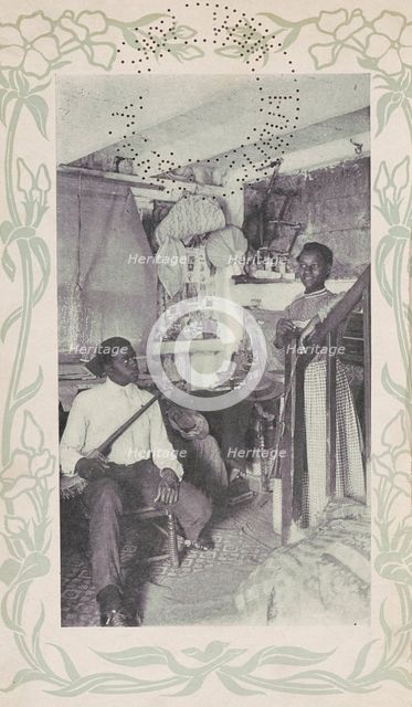 Man seated with banjo next to woman at stairs, 1903. Creator: Camera Club.