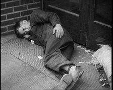 Man Sleeping in a Doorway, 1933. Creator: British Pathe Ltd