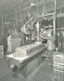 Man using a miller and planer, Charlton Central Repair Depot, London, 1932