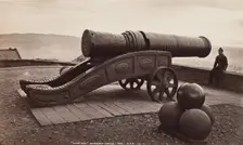 Man with Cannon, Edinburgh Castle, between 1870 and 1880. Creator: George Washington Wilson