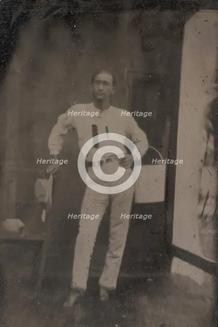 Man with a Bucket on his Arm, 1880s-90s. Creator: Unknown.