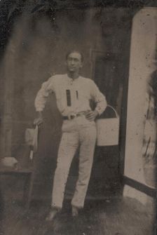Man with a Bucket on his Arm, 1880s-90s. Creator: Unknown