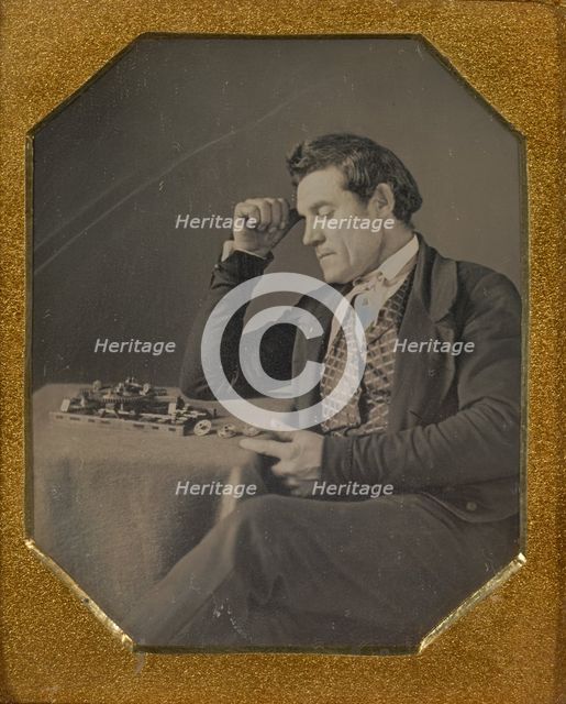 Man with a primitive calculating machine, about 1845. Creator: Unknown.