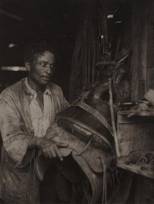 Man With A Saddle, c1920s. Creator: Doris Ulmann