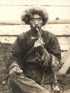 Manchu smoking a pipe, 1909. Creator: Vladimir Ivanovich Fedorov