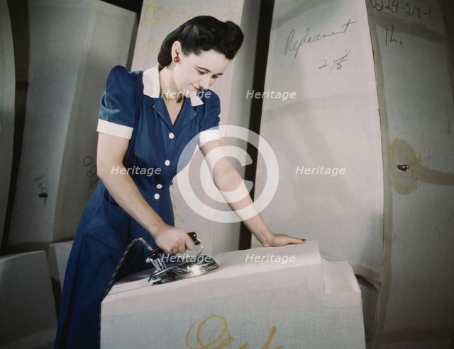 Manufacture of self-sealing gas tanks, Goodyear Tire and Rubber Co., Akron, Ohio, 1941. Creator: Alfred T Palmer.