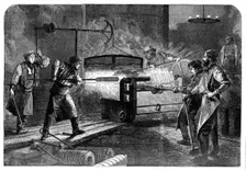 Manufacture of the Armstrong Gun at Woolwich Arsenal: coiling the bars, 1862. Creator: Unknown
