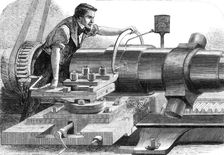 Manufacture of the Armstrong Gun at Woolwich Arsenal: finish-turning a 100-pounder, 1862. Creator: Unknown