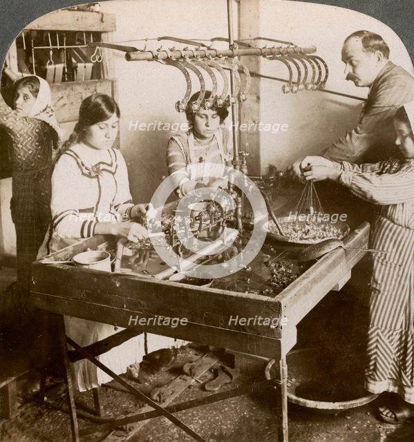 Manufacturing silk, Syria, 1900s.Artist: Underwood & Underwood