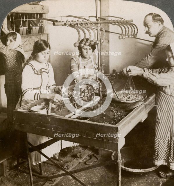 Manufacturing silk, Syria, 1900s.Artist: Underwood & Underwood