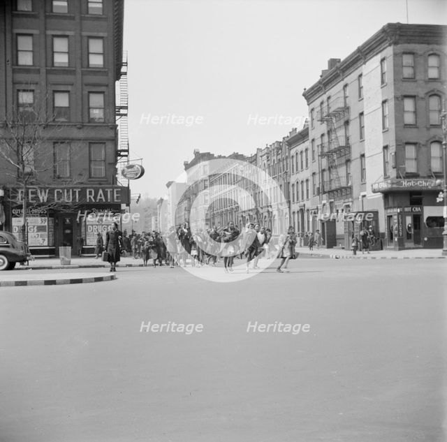 Many accidents are attributed to unpatrolled intersections in Harlem, New York, 1943. Creator: Gordon Parks.