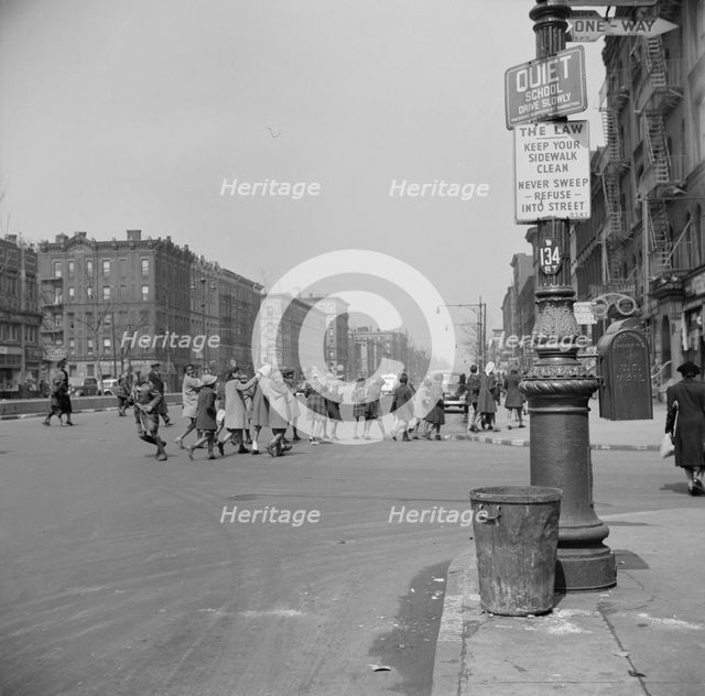 Many accidents are attributed to unpatrolled intersections in Harlem, New York, 1943. Creator: Gordon Parks.