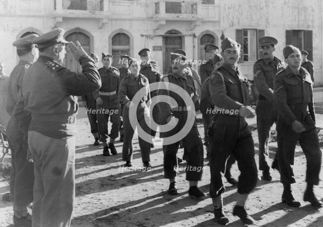 March-past by members of the Jewish Brigade, Tripoli, Libya, 30 January 1943.  Creator: Unknown.