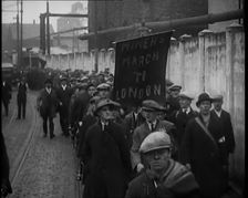 Marchers Carrying a Banner Which Reads: Miners March to London 1931. Creator: British Pathe Ltd