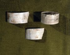 Marble bracelets decorated with parallel carved lines, from the Bat Cave, Zuheros (Córdoba)
