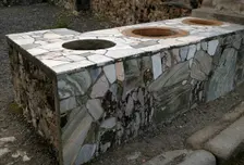Marble-covered counter, Thermopolium, Pompeii, Italy, 2009. Creator: LTL