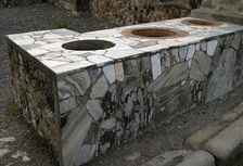 Marble-covered counter, Thermopolium, Pompeii, Italy, 2009. Creator: LTL