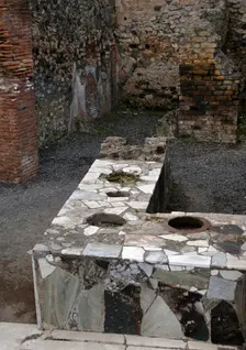 Marble-covered counter, Thermopolium, Pompeii, Italy, 2009. Creator: LTL