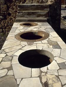 Marble-covered counter, Thermopolium, Via Consolare, Pompeii, Italy, 2002. Creator: LTL