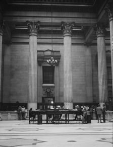 Marble hall of the Custom House, New Orleans, between 1920 and 1926. Creator: Arnold Genthe