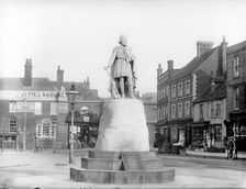 Marble statue depicting Alfred the Great, Market Place, Wantage, Oxfordshire, 1895. Creator: Henry Taunt