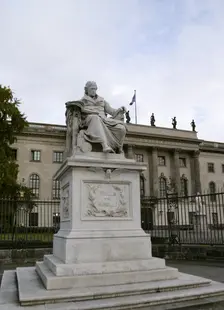 Marble statue of Wilhelm von Humboldt at the entrance to Humboldt University, Berlin, Germany, 2025. Creator: LTL