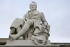 Marble statue of Alexander von Humboldt, entrance to Humboldt University, Berlin, Germany, 2025. Creators: LTL, Reinhold Begas