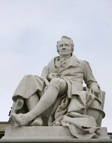 Marble statue of Alexander von Humboldt, entrance to Humboldt University, Berlin, Germany, 2025. Creators: LTL, Reinhold Begas