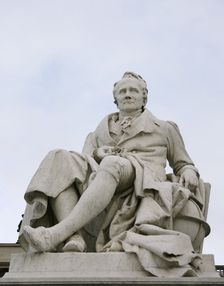 Marble statue of Alexander von Humboldt, entrance to Humboldt University, Berlin, Germany, 2025. Creators: LTL, Reinhold Begas
