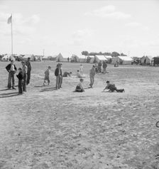 Marble time in FSA migratory labor camp, near Calipatria, Imperial Valley, CA, 1939. Creator: Dorothea Lange