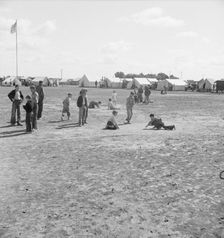 Marble time in FSA migratory labor camp, near Calipatria, Imperial Valley, CA, 1939. Creator: Dorothea Lange