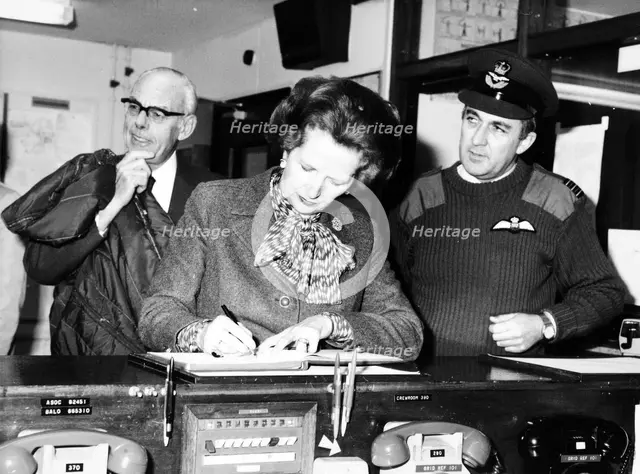 Margaret and Denis Thatcher on a visit to Northern Ireland, 23 December 1982. Creators: Central Office of Information, Unknown.