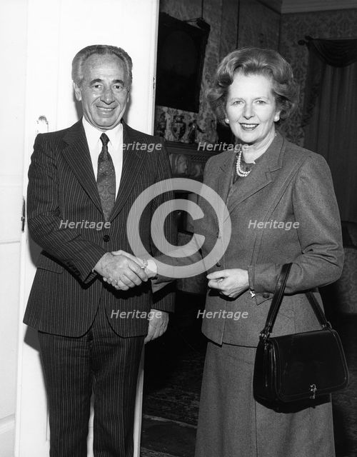 Margaret Thatcher (1925-), British Prime Minister with Shimon Peres, Israeli Prime Minister, 1987. Creator: Sidney Harris.