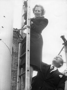 Margaret Thatcher climbs up a chimney stack, Lambeth, 14th April 1978