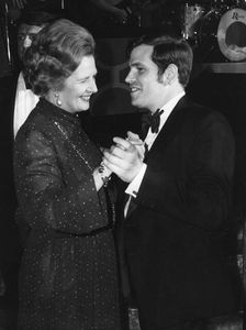 Margaret Thatcher dancing with Nick Tate at a Brighton ball, 9th October 1980